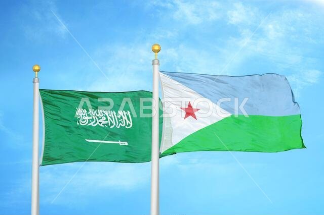 Saudi Arabia and Djibouti two flags on flagpoles and blue cloudy sky