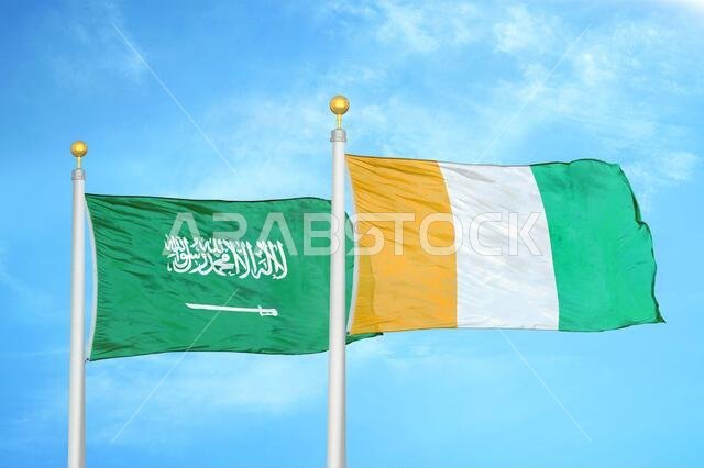 Saudi Arabia and Cote d'Ivoire Ivory coast two flags on flagpoles