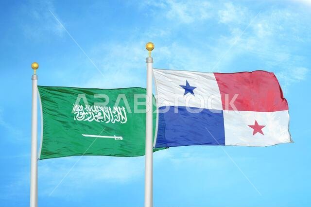 Saudi Arabia and Panama two flags on flagpoles and blue cloudy sky