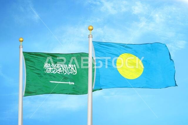 Saudi Arabia and Palau two flags on flagpoles and blue cloudy sky