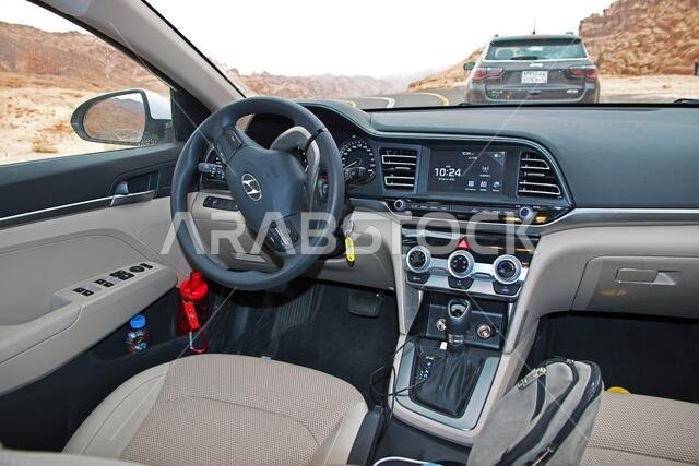 The car in Wadi Disah, Al Shaq canyon, Saudi Arabia