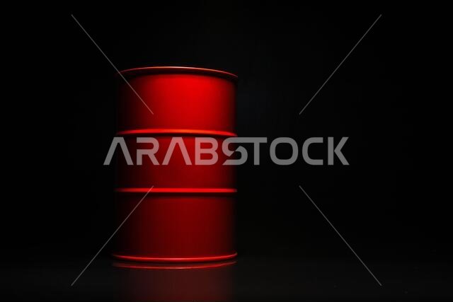 Red barrel of oil on a black background for design.
