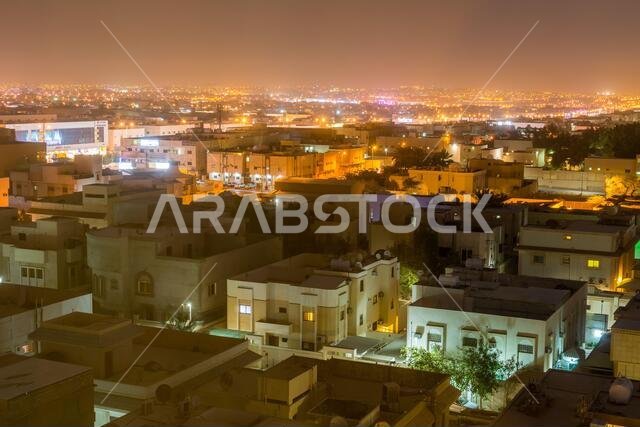 Aerial night view with neon light of Riyadh with buildings in the downtown of Riyadh, Saudi Arabia