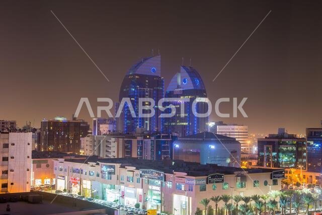 Aerial night view with neon light of Riyadh with Twin building of Alinma Bank  in Riyadh, Saudi Arabia