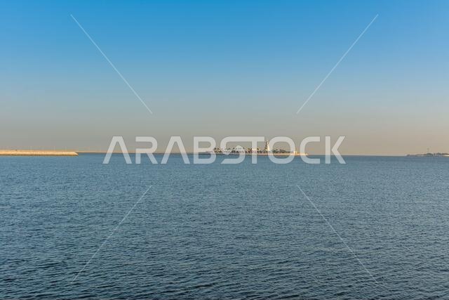 Blue sea and island with blue sky in the morning at the corniche park in Dammam, Kingdom of Saudi Arabia
