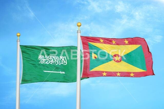 Saudi Arabia and Grenada two flags on flagpoles and blue cloudy sky