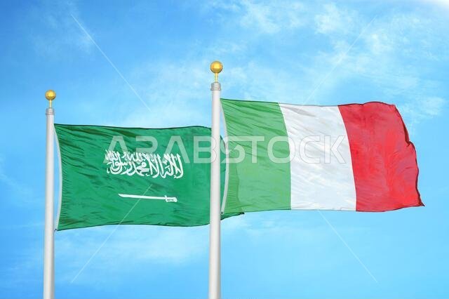 Saudi Arabia and Italy two flags on flagpoles and blue cloudy sky