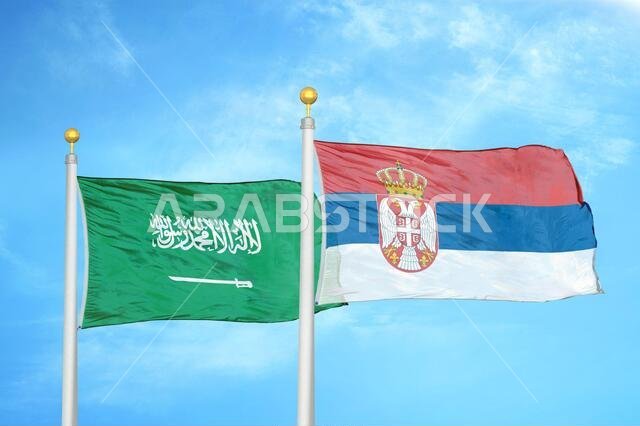 السعودية وصربيا، علمان على سارية علم وسماء زرقاء ملبدة بالغيوم السعودية وصربيا، علمان على سارية علم وسماء زرقاء ملبدة بالغيوم
