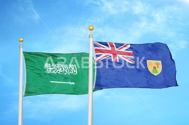 المملكة العربية السعودية وجزر تركس وكايكوس ترفعان علمين على ساريتين.
