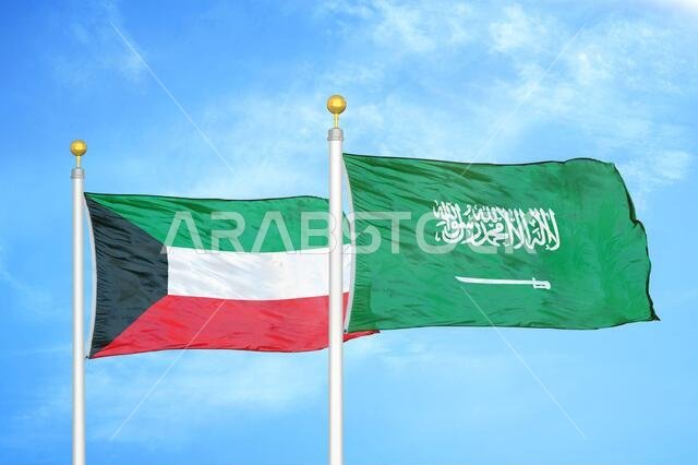 Kuwait and Saudi Arabia two flags on flagpoles and blue sky