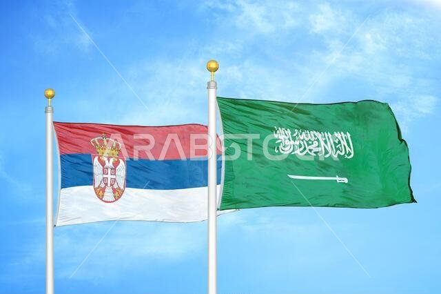Serbia and Saudi Arabia two flags on flagpoles and blue sky