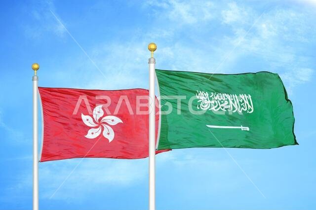 Hong Kong and Saudi Arabia two flags on flagpoles and blue cloudy sky