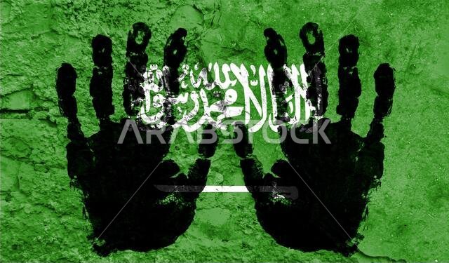Handprints on the background of the flag of Saudi Arabia. Freedom of choice, corruption, and detention concept