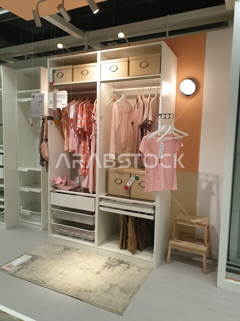 IKEA store selling wardrobes with the latest style, interior design, attention to detail and arrangement, innovative storage methods, shops selling furniture and home accessories.