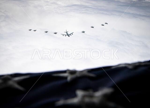 A U.S. Air Force KC-135 Stratotanker, U.S. Air Force F-15C Eagles, F-15E Strike Eagles, and Royal Saudi Air Force F-15SAs fly over Saudi Arabia while participating in a large formation exercise, Sept. 10, 2020.  AFCENT continues to build and strengthen our regional partners by training alongside one another, integrating capabilities and increasing interoperability to project agile combat employment from established and austere locations throughout the U.S. Central Command area of responsibility 