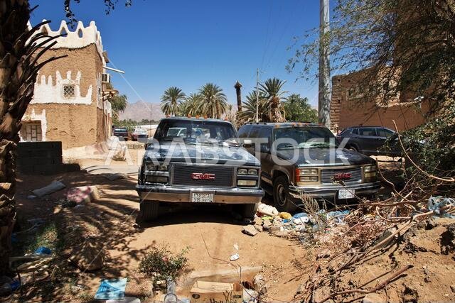 Old cars in the arab village close Najran, Asir region, Saudi Arabia