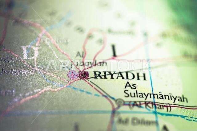 Shallow depth of field focus on geographical map location of Riyadh city in Saudi Arabia Arab Asia continent on atlas