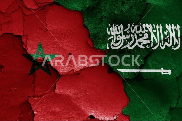أعلام المغرب والسعودية مرسومة على جدار متصدع