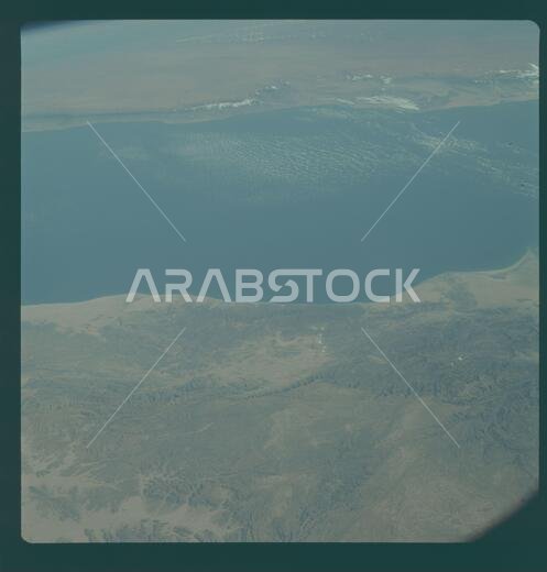 AS09-24-3673 - Apollo 9 - Apollo 9 Mission image - Earth Observation - Gulf of Aden and Saudi Arabia; Scope and content:  The original database describes this as: Description: Oblique Earth Observation taken by the Apollo 9 crew. View is of the Gulf of Aden and Saudi Arabia.  Film magazine was F,film type was SO-368 Ektachrome with 0.460 - 0.710 micrometers film / filter transmittance response and haze filter,80mm lens. Latitude was 13.20 N by Longitude 45.07 E, Overlap was 0%%, Altitude miles w