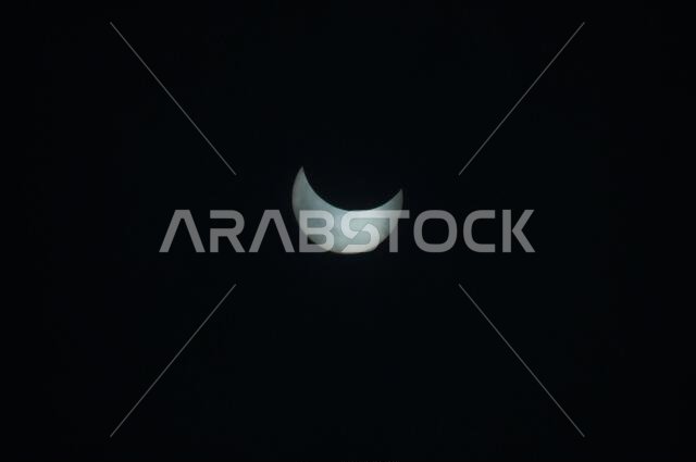 Beawar, Rajasthan, India, June 21, 2020: A view of the solar eclipse as seen in the sky from Beawar. A solar eclipse occurs when the moon comes in between the earth and the sun and when all the three bodies are aligned. Today's eclipse appeared in Saudi Arabia, Qatar, United Arab Emirates, Oman, India, Sri Lanka, Malaysia, Indonesia, Singapore, Northern Mariana Islands and Guam. Credit: Sumit Saraswat/Alamy Live News