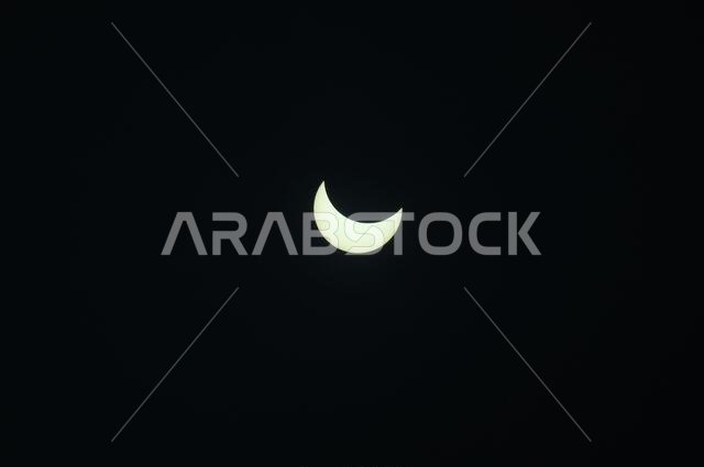 Beawar, Rajasthan, India, June 21, 2020: A view of the solar eclipse as seen in the sky from Beawar. A solar eclipse occurs when the moon comes in between the earth and the sun and when all the three bodies are aligned. Today's eclipse appeared in Saudi Arabia, Qatar, United Arab Emirates, Oman, India, Sri Lanka, Malaysia, Indonesia, Singapore, Northern Mariana Islands and Guam. Credit: Sumit Saraswat/Alamy Live News