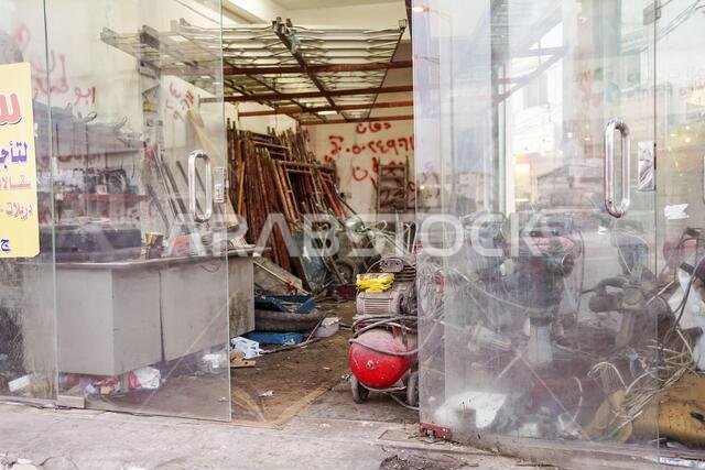 Abha / Saudi Arabia - January 23, 2020: old tousled and broken shop with machines to repair