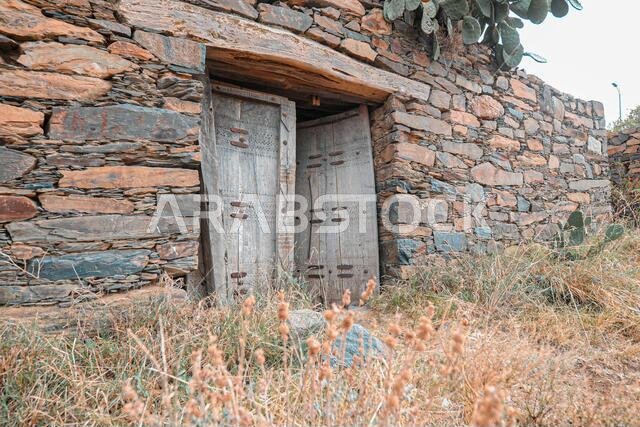 Old building with old wooden door, heritage. Saudi Arabia