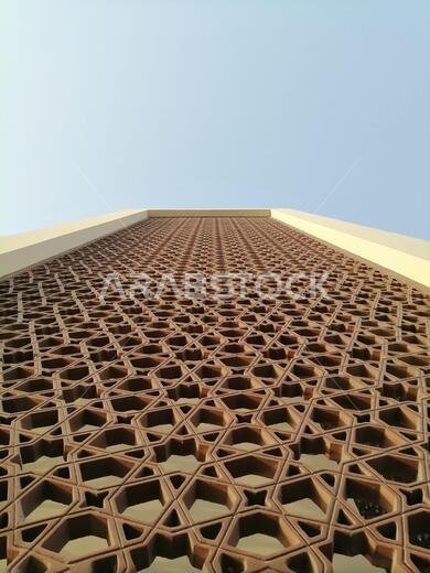 خلفية بنمط أرابيسك حديث. يرتبط هذا التصميم الجميل بالحضارة الإسلامية القديمة، ويتميز بأشكال هندسية متكررة.
