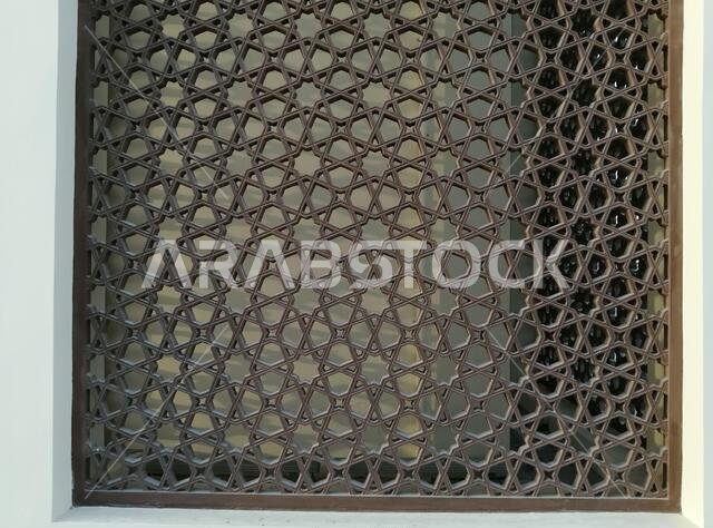 Modern Arabesque pattern background. Associated with ancient Islamic civilization the beautiful design features repetitive geometric forms or shapes.