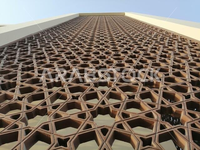 Modern Arabesque pattern background. Associated with ancient Islamic civilization the beautiful design features repetitive geometric forms or shapes.