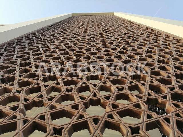 Modern Arabesque pattern background. Associated with ancient Islamic civilization the beautiful design features repetitive geometric forms or shapes.