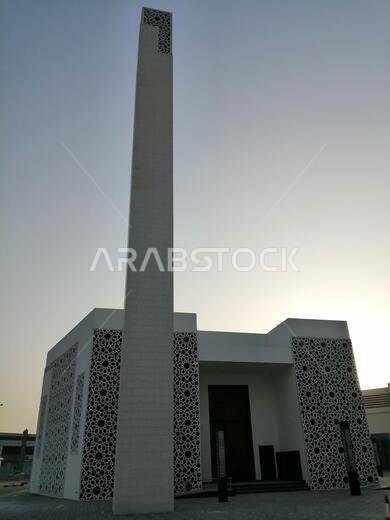 Muslim mosque with modern Arabesque pattern. Associated with ancient Islamic civilization the design features repetitive geometric forms or shapes.