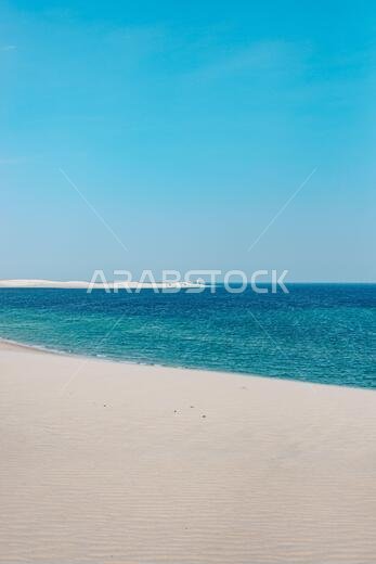 The desert in the south of Qatar runs into the Khor Al Adaid (Khawr al Udayd) or Inland Sea, part of the Persian Gulf (Arabian Gulf)