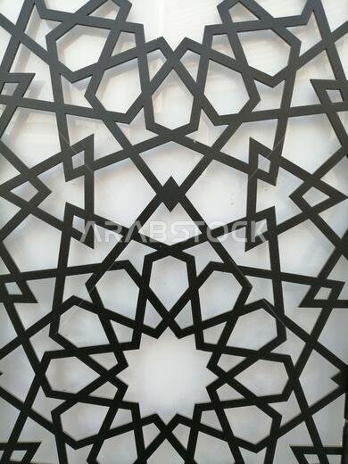 Modern Arabesque pattern background. Associated with ancient Islamic civilization the beautiful design features repetitive geometric forms or shapes.