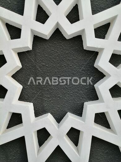 Modern Arabesque pattern background. Associated with ancient Islamic civilization the beautiful design features repetitive geometric forms or shapes.