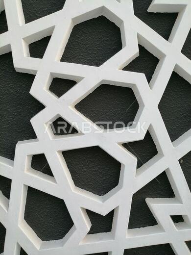 Modern Arabesque pattern background. Associated with ancient Islamic civilization the beautiful design features repetitive geometric forms or shapes.