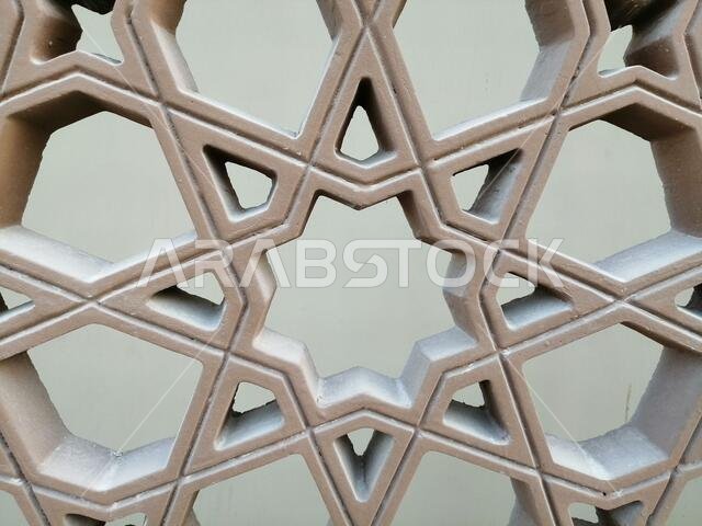 Modern Arabesque pattern background. Associated with ancient Islamic civilization the beautiful design features repetitive geometric forms or shapes.
