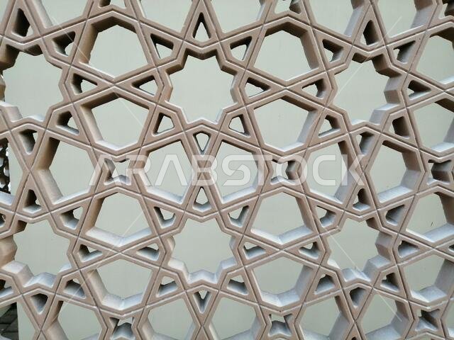 Modern Arabesque pattern background. Associated with ancient Islamic civilization the beautiful design features repetitive geometric forms or shapes.