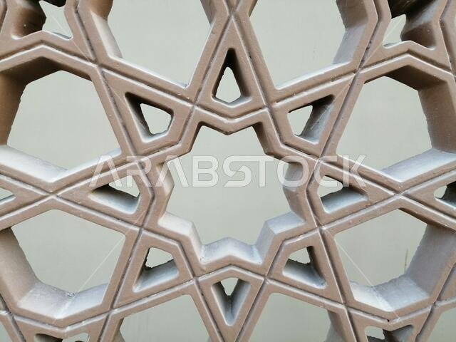 Modern Arabesque pattern background. Associated with ancient Islamic civilization the beautiful design features repetitive geometric forms or shapes.