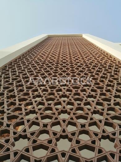 Modern Arabesque pattern background. Associated with ancient Islamic civilization the beautiful design features repetitive geometric forms or shapes.