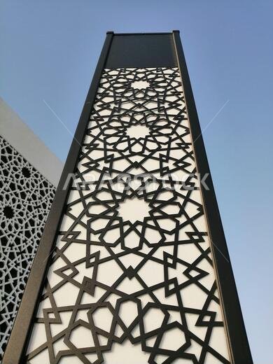 Modern Arabesque pattern background. Associated with ancient Islamic civilization the beautiful design features repetitive geometric forms or shapes.