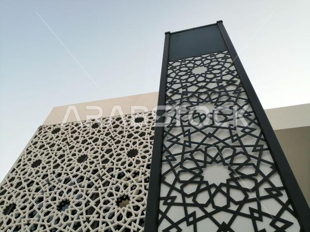 Modern Arabesque pattern background. Associated with ancient Islamic civilization the beautiful design features repetitive geometric forms or shapes.