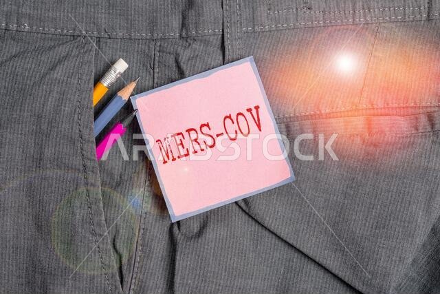 Handwriting text writing Mers Cov. Conceptual photo viral respiratory illness that first reported Saudi Arabia Writing equipment and pink note paper i