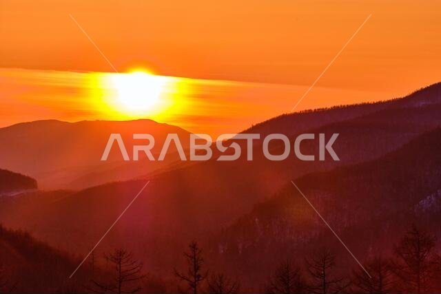 Sunset among the mountains on the road Lidoga-Vanino Khabarovsk territory
