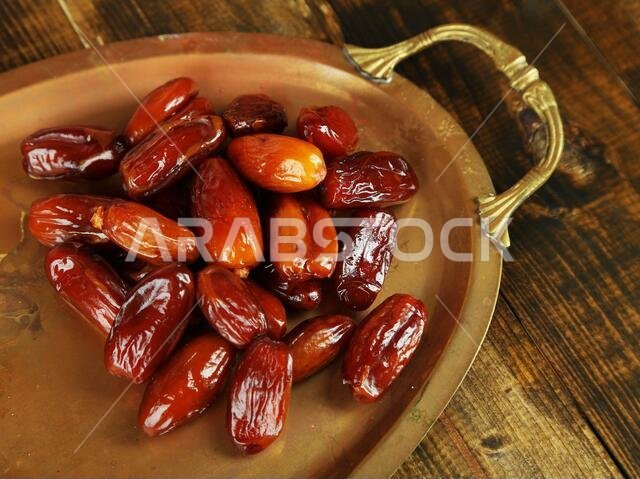 Conceptual photo of Ramadan food:dates palm on tray