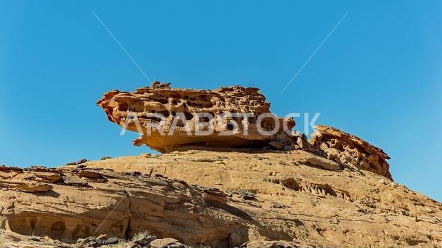 Honeycombed desert rock formation