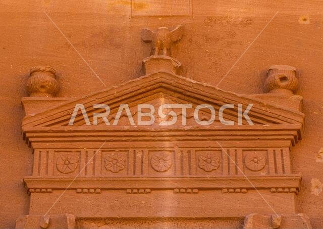Top of the entrance of a tomb in al-Hijr archaeological site in Madain Saleh, Al Madinah Province, Alula, Saudi Arabia