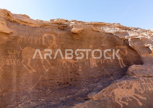 Petroglyphs rock art depicting humans and ibex, Najran Province, Thar, Saudi Arabia