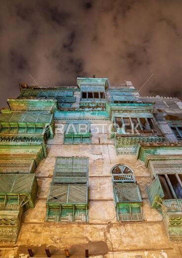 Historic house with wooden mashrabiyas in al-Balad quarter at night, Mecca province, Jeddah, Saudi Arabia