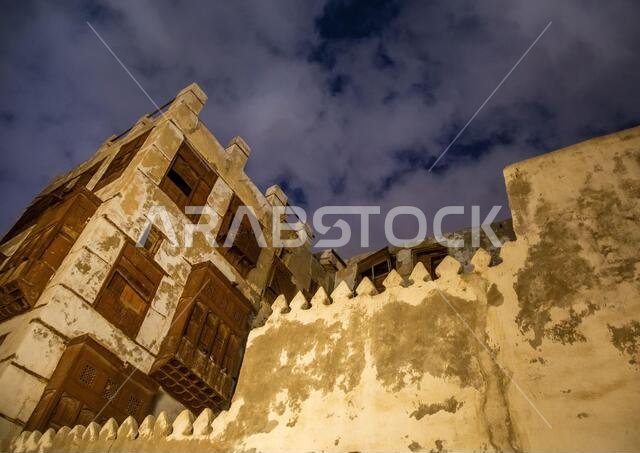 Historic house with wooden mashrabiyas in al-Balad quarter at night, Mecca province, Jeddah, Saudi Arabia